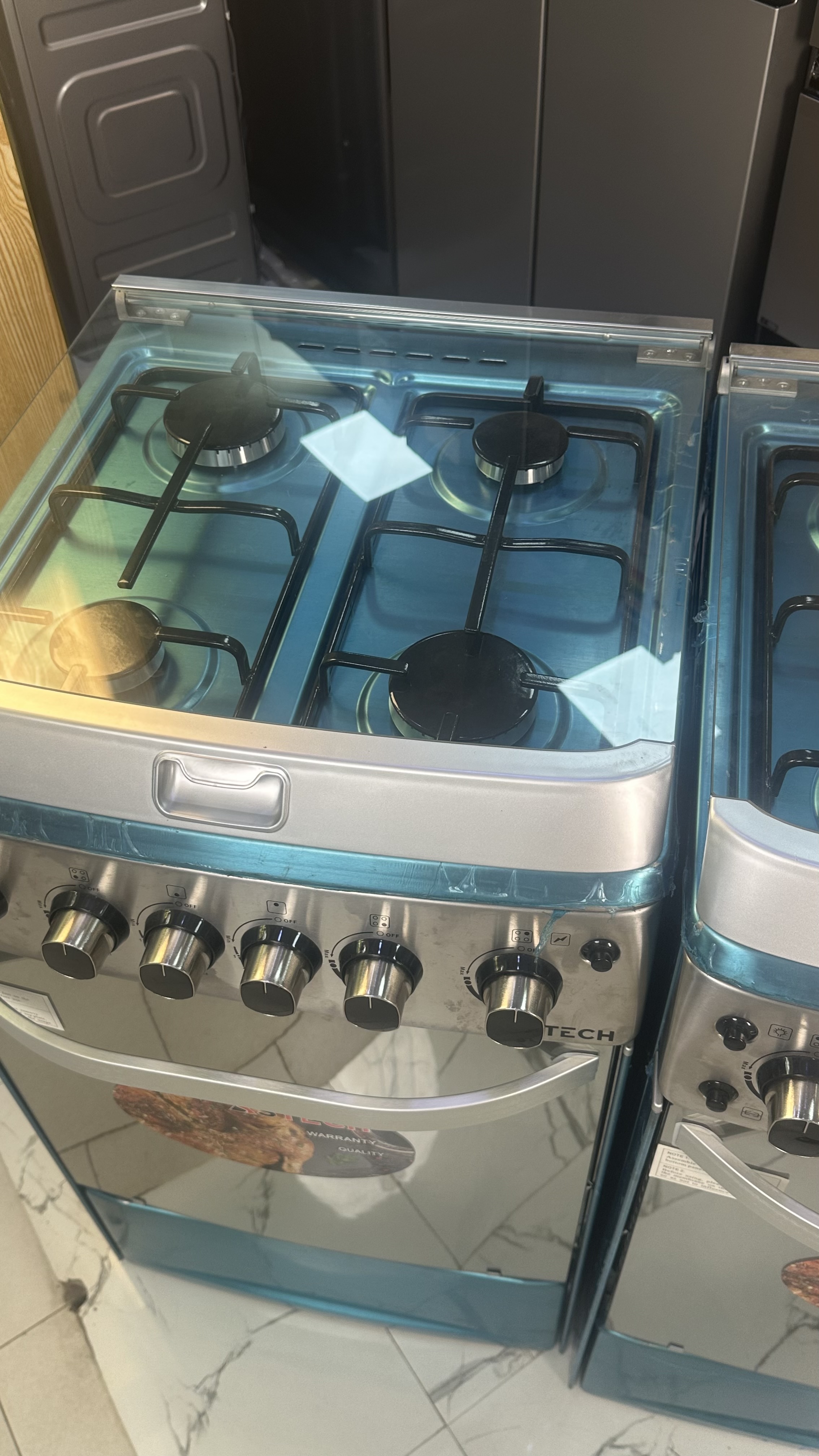 Cuisinière 4 feu 50x50